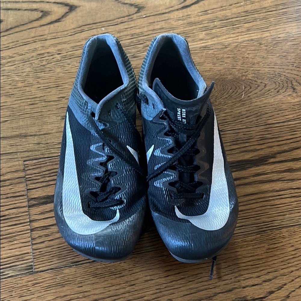 Nike Black and White track spikes for sprinting